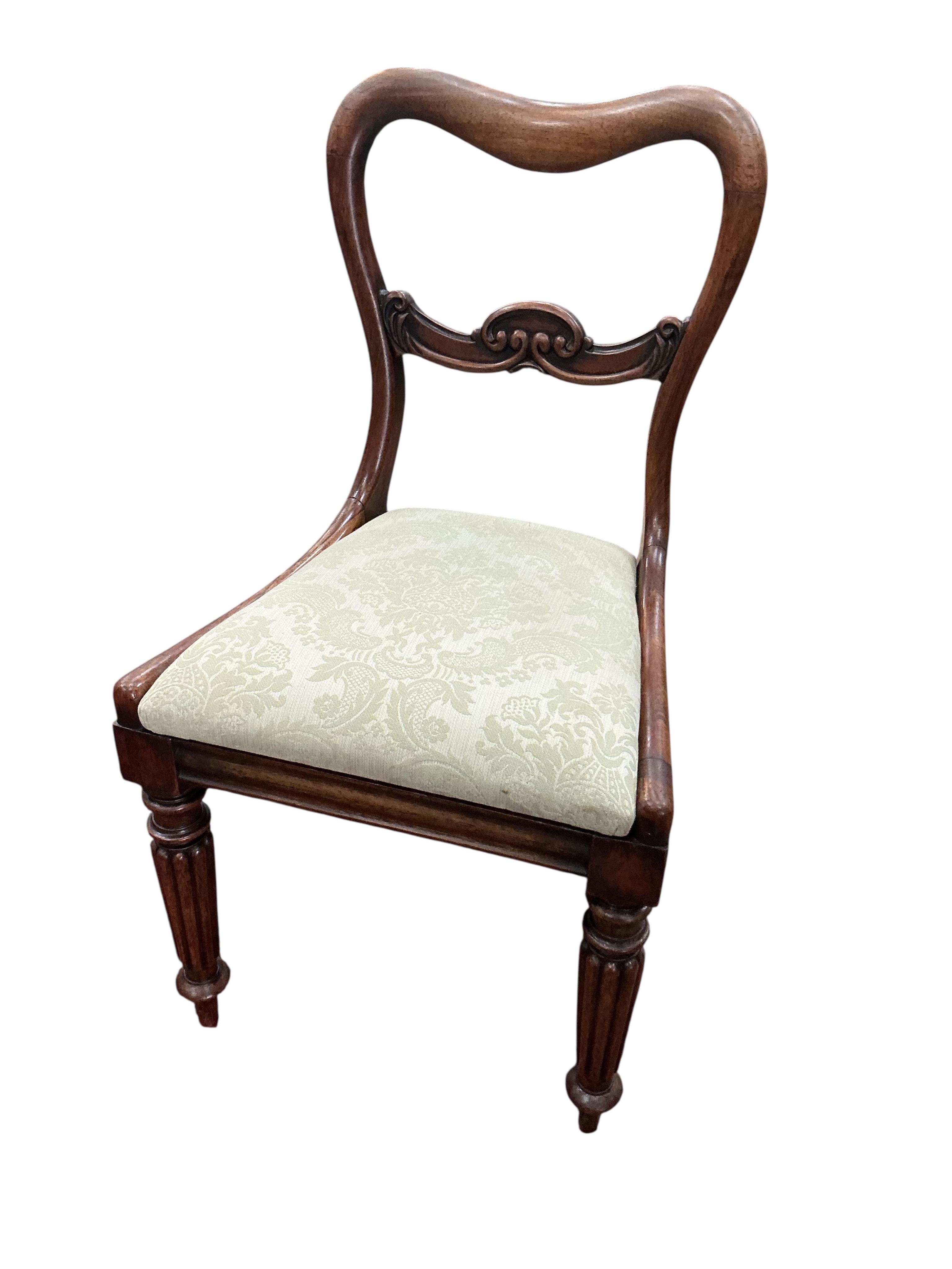 A set of six early Victorian rosewood dining chairs